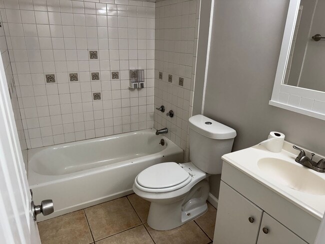 Photo - Spacious 3-Bedroom, 2-Bath Triplex – Clean... Unit B