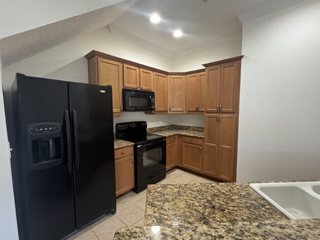 Photo - "Spacious 3-Bed Townhouse Retreat in Tampa's Heart - Modern Comforts Await!" Unit 1