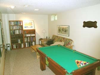 Finished basement (now includes an egress window in place of the small window, not shown). There is also a furnace room that has a lot of storage space. - 2261 Scudder Street
