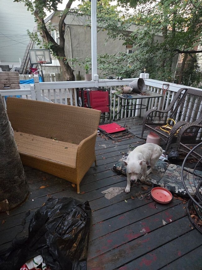 Photo - 5BR/1.5BA Row Home with Backyard and Laund...