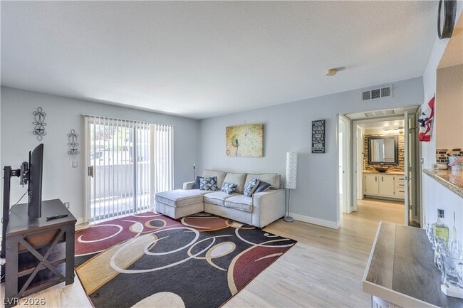 Building Photo - 5055 W Hacienda Ave Unit 1037