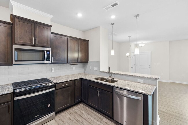 Photo - Luxury 3BR Townhome Near Costco & 540 – Built in 2023!