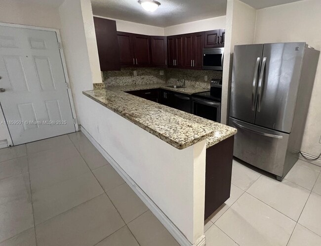 Building Photo - 7230 NW 179th St Unit 102 Rental