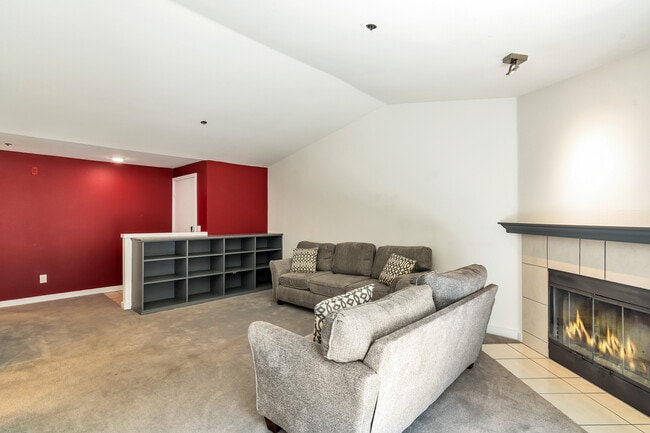 Living room with the fireplace. - 19404 Bothell Way NE Unit B304