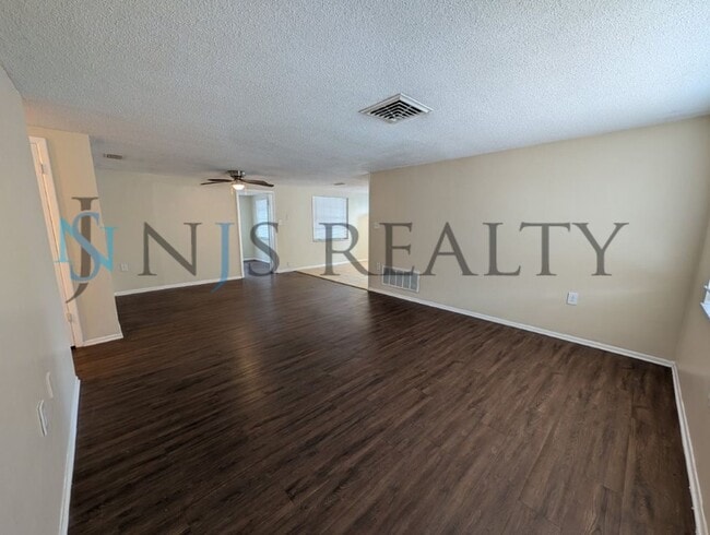 Photo - True 3 Bed~2 Bath~with garage. Over 1,000 sq ft, with updated kitchen & bathrooms, large open liv...