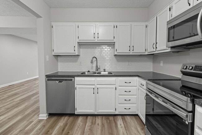 Photo - Broad Ripple townhome with garage, updated kitchen, and walkable convenience!