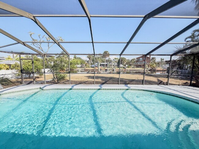 Photo - WATERFRONT POOL HOME ON A CANAL THAT LEADS STRAIGHT INTO TAMPA BAY - NEW DOCK AND SEAWALL COMING ...