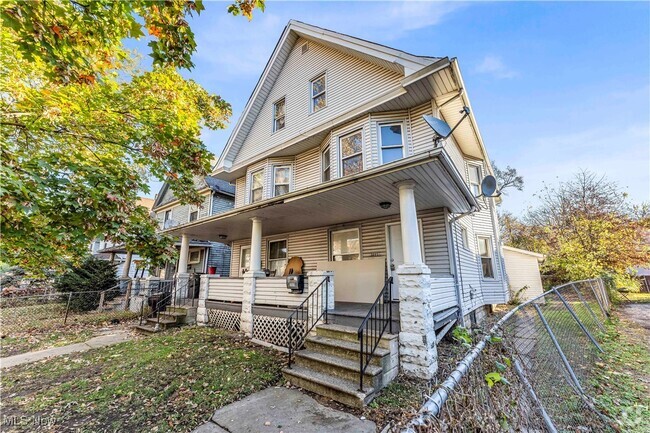 Building Photo - 3895 W 37th St Unit Right Side Rental