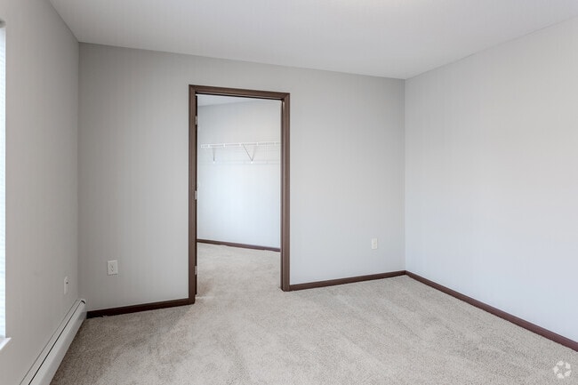 2BR, 1BA - 1,076SF - Primary Bedroom - Cardinal Pines Apartment Homes