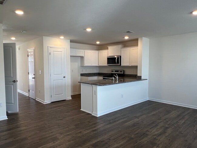 Photo - Beautiful New Construction 3 bedroom 2.5 Condo   with garage- Water, trash & sewer incuded!
