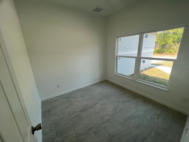 Photo - MODERN BRAND NEW 4BD/2BA RETREAT IN LEHIGH ACRES!