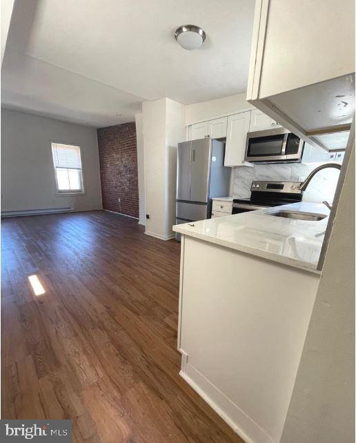 Building Photo - 2534 Poplar St Unit D