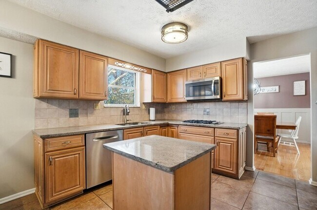 Photo - Spacious 4BR Home with Finished Basement & Fenced Yard in Olentangy Hills