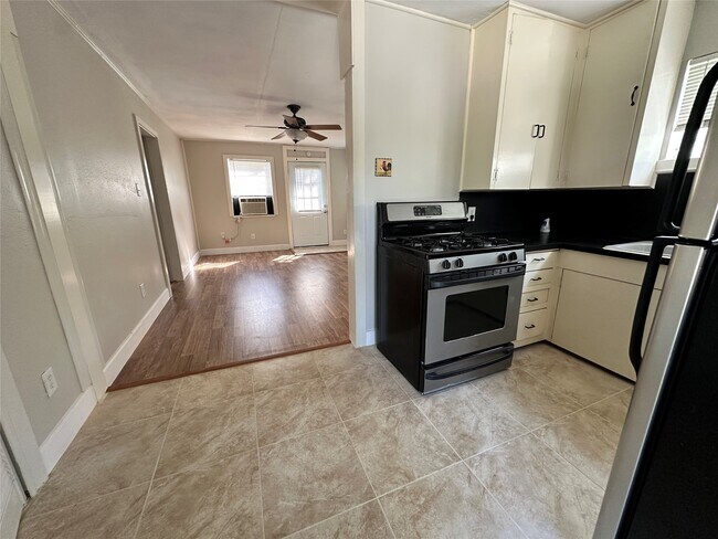 Building Photo - 7110 McHenry St Unit B-TOP