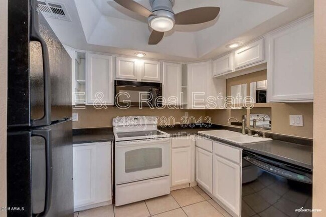 Building Photo - 1402 S Jentilly Ln Unit 205