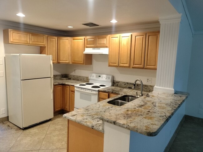 Photo - Beautiful home with fenced in backyard!