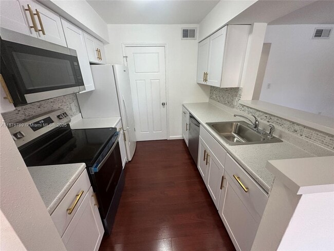 Building Photo - 2341 NW 33rd St Unit 409 Rental