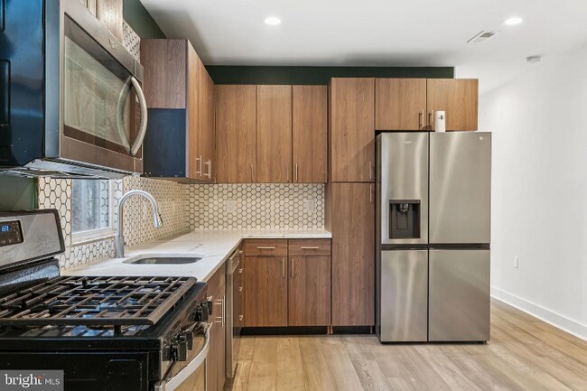 Photo - 2146 N Van Pelt St Unidad Apt #2