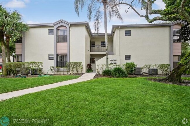 Building Photo - 4485 Carambola Cir N Unit 27322 Rental