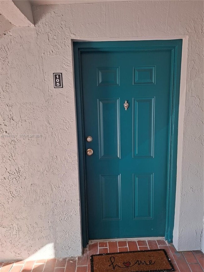 Building Photo - 7160 NW 179th St Unit 105