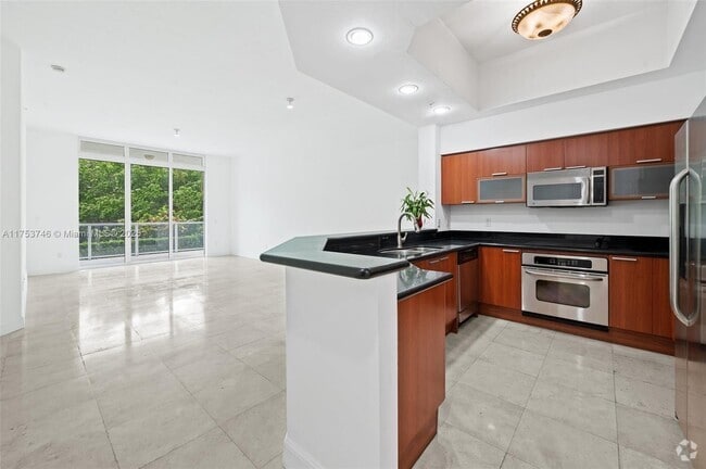 Building Photo - 15051 Royal Oaks Ln Unit 103 Rental