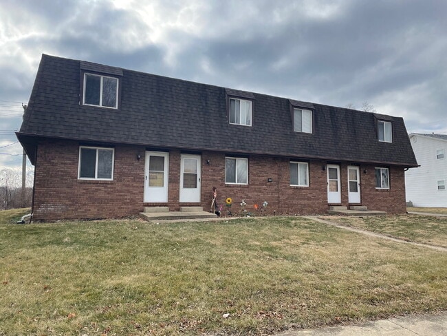 Photo - Up Where We Belong — Spacious 2-Story Townhome with Basement Unit #3