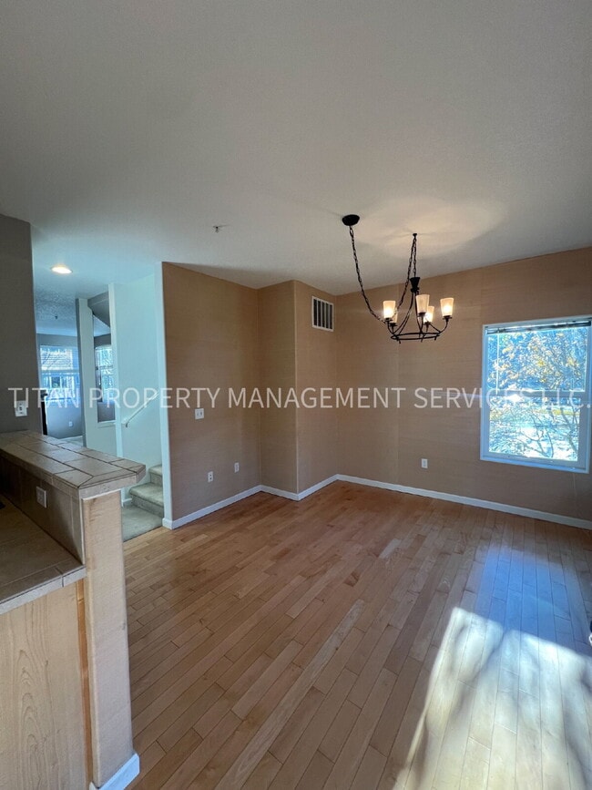 Photo - Beautiful Three Story Townhouse with Gas Fireplace, Balcony & 2-Car Garage Unit 101
