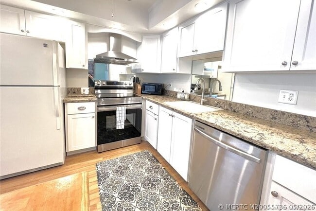 Building Photo - 1800 SE St Lucie Blvd Unit 10-207