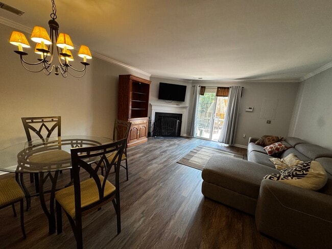 Photo - Furnished 2BR, 2BA Condo with Backyard in ...