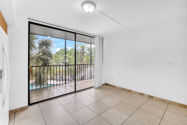 Building Photo - 8540 SW 133rd Avenue Rd Unit 312