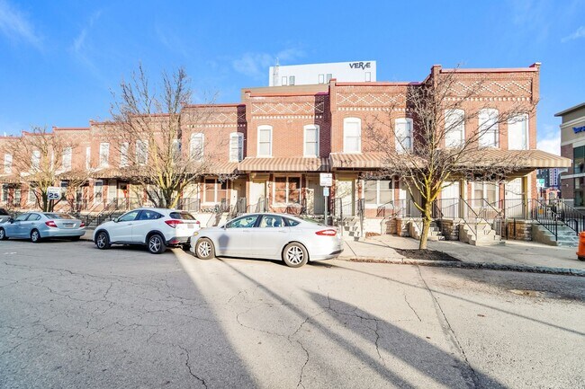 Photo - Charming 1-Bedroom Apartment with Exposed Brick, Hardwood Floors & Updated Kitchen