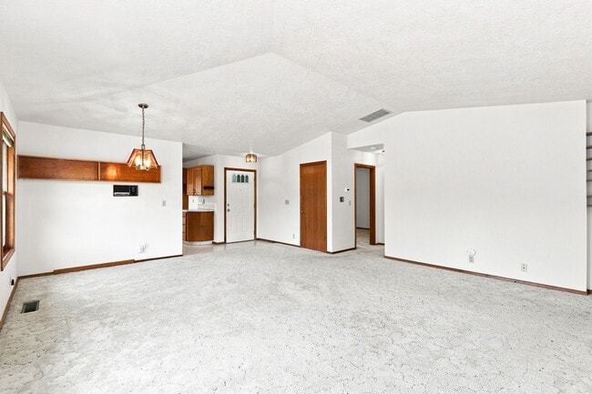 Photo - Charming 3-Bedroom Home with Garage & Lawn Care Included