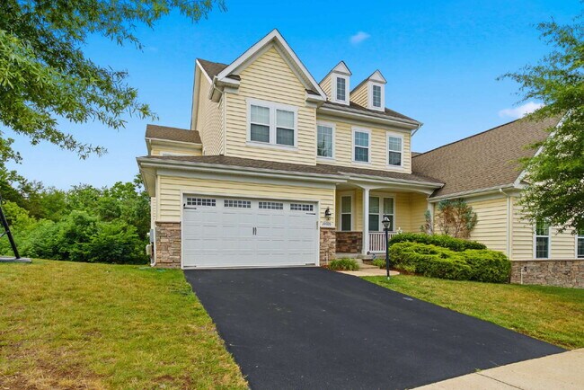 Sophisticated Colonial Offering Refined Finishes, Gourmet Kitchen & Spacious Floor Plan