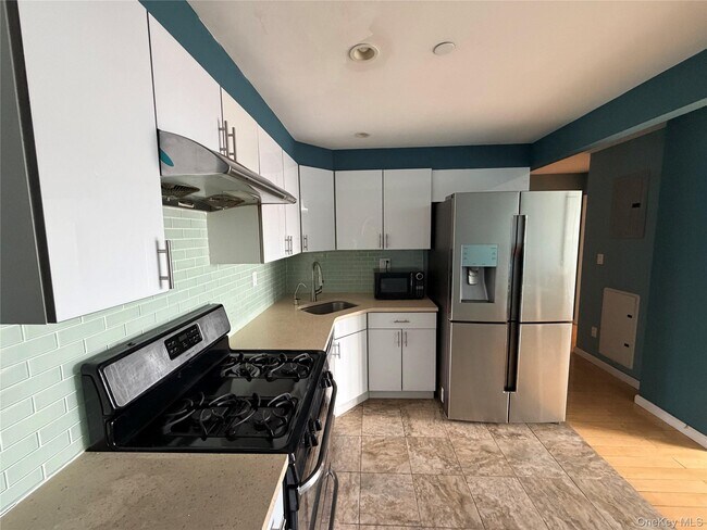 Building Photo - 143-28 41st Ave Unit 8C