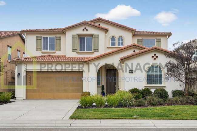 Building Photo - Spacious Elegance Awaits: 4-Bedroom Home with Hardwood Floors in Elk Grove!