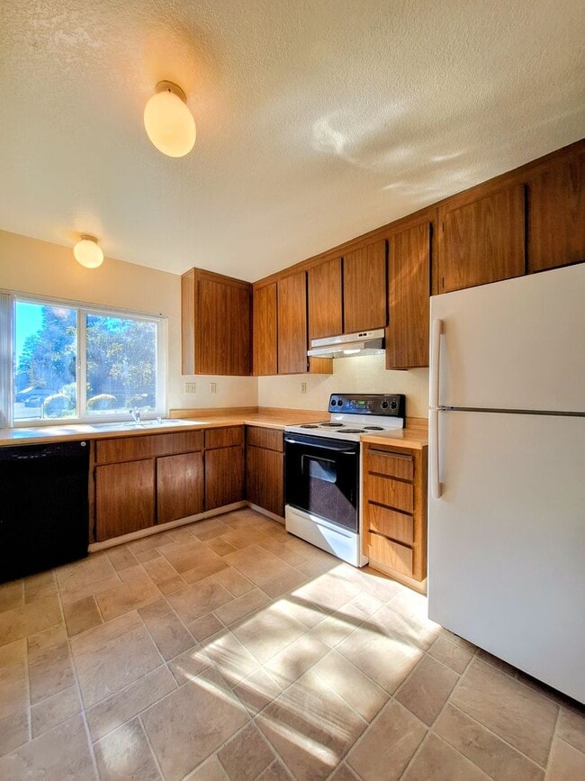 Photo - Spacious 2bd First Floor Condo W/Private Patio, Attached Garage, & Private Laundry Room