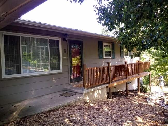 front of house - car port, raised porch area, peach tree - 3 Morris Ln Rental