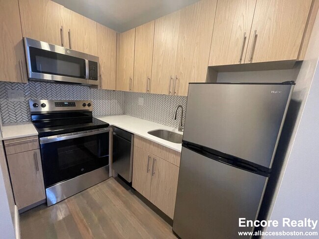 Photo - 457 Centre St Unit 210