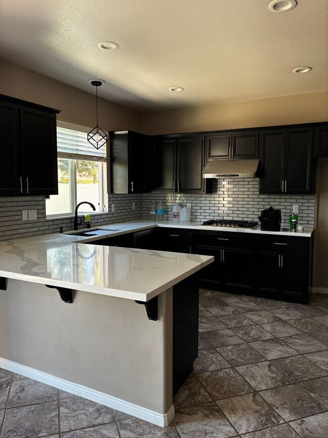 Photo - Smart 3-Bedroom Home with Solar & 2-Car Ga...