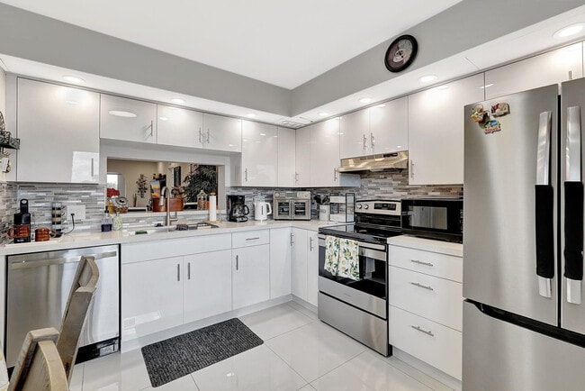 Photo - 1401 SW 128th Terrace Unidad 406H