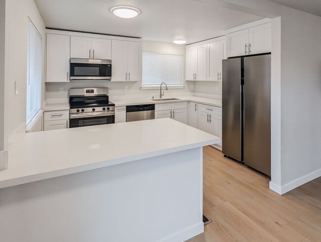 Photo - **Move-in Special** Gorgeous Remodeled 4 bed 2 bath w/ 2 car garage!