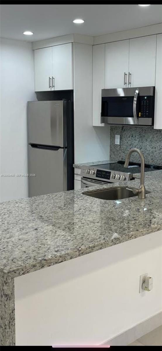 Building Photo - 7732 Camino Real Unit F-318