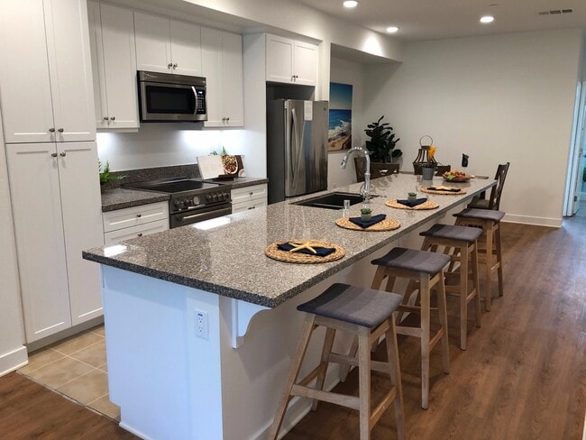 Photo - Gorgeous 4 bed/4 bath w/2 car garage in new community w/pool less than 1 mile to the beach!