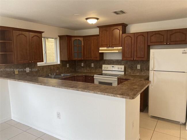 Building Photo - 7010 NW 6th Ct Unit U Rental