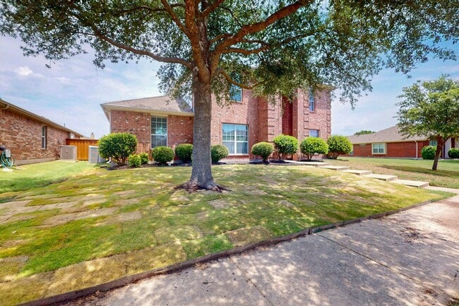 Photo - Spacious 4-Bedroom Home with Bonus Room and Large Backyard in Caruth Lake