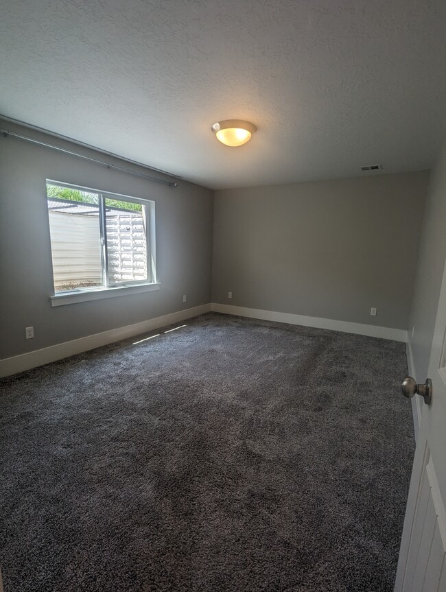 Master bedroom - 254 S. 1000 E. Unit B Unit Red Door Rental