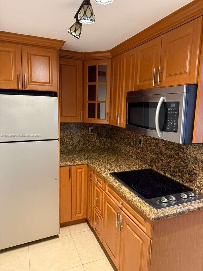Building Photo - 7000 NW 186th St Unit 4-129A Rental