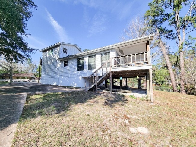 Photo - Escape to your updated 3-bed, 2-bath oasis in Goodrich, TX, featuring modern finishes, an open la...