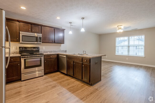 2BR, 1BA - 1,025 SF - Kitchen & Living Room - Six Mile Lane Apartments