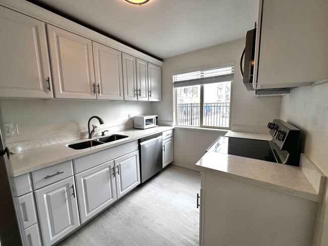 Photo - Updated 2-Bedroom Condo with Water Views, 2 Parking Spaces & Poolside Location Unidad 203